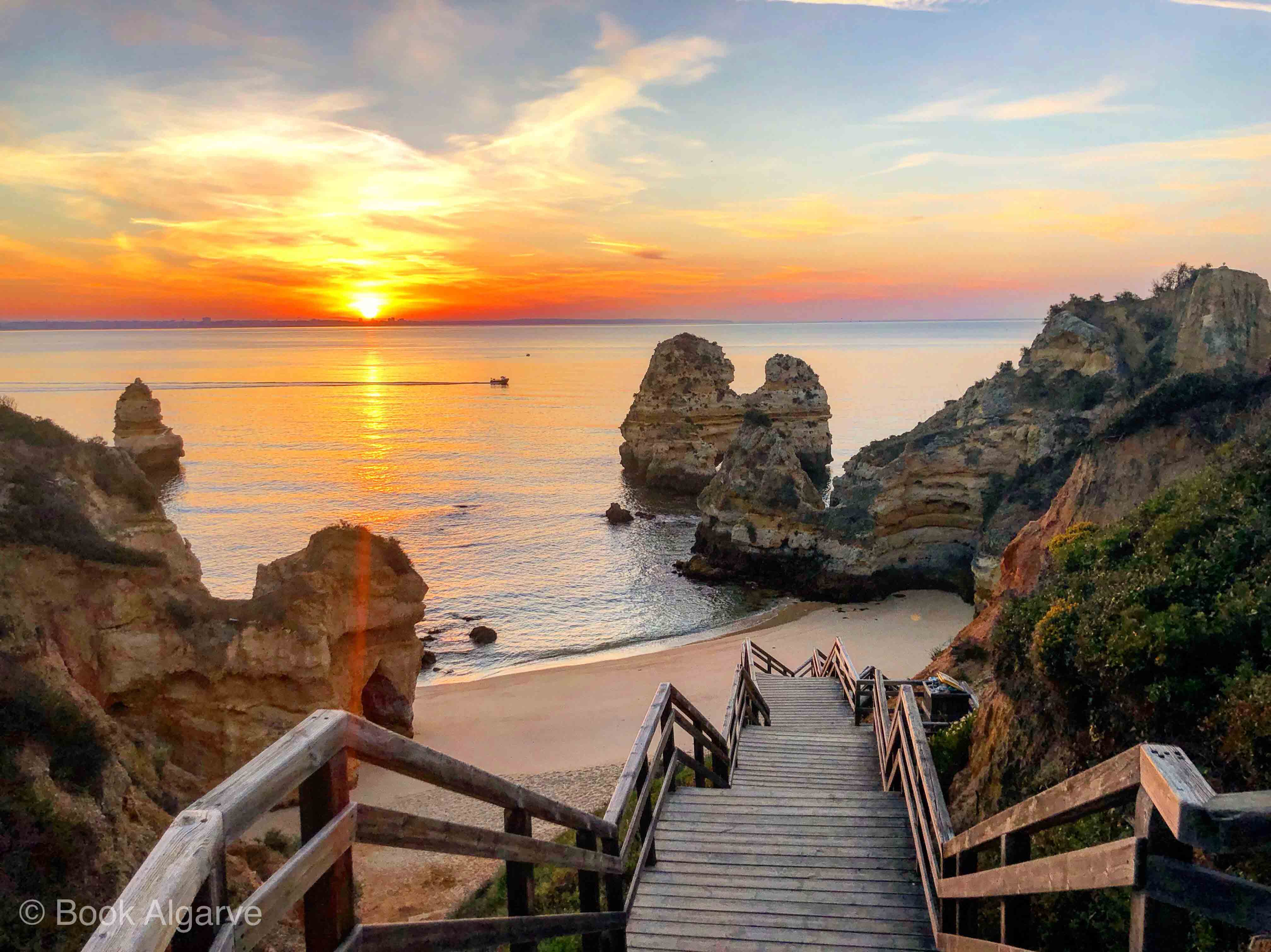 Top of the stairs view of Praia Do Camilo beach