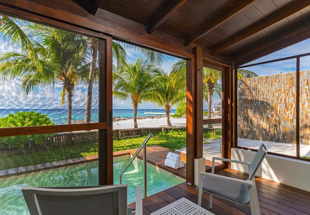 private room view of the beach, palm trees at the westin cozumel mexico