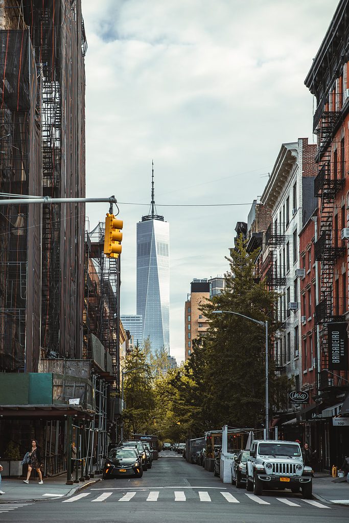 empty street in NOHO, NYC and you can spot the Freedom Tower in the distance 