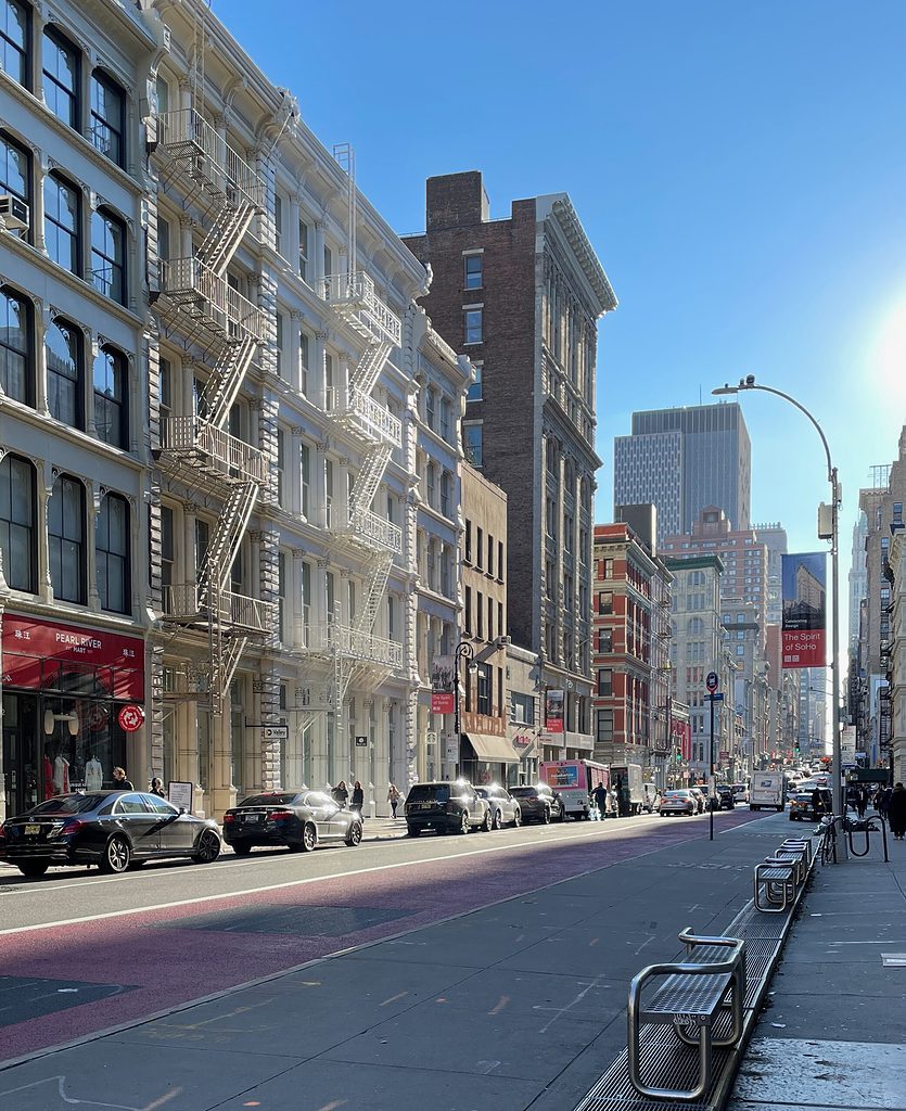 popular street in soho, NYC to go shopping on a sunny day 