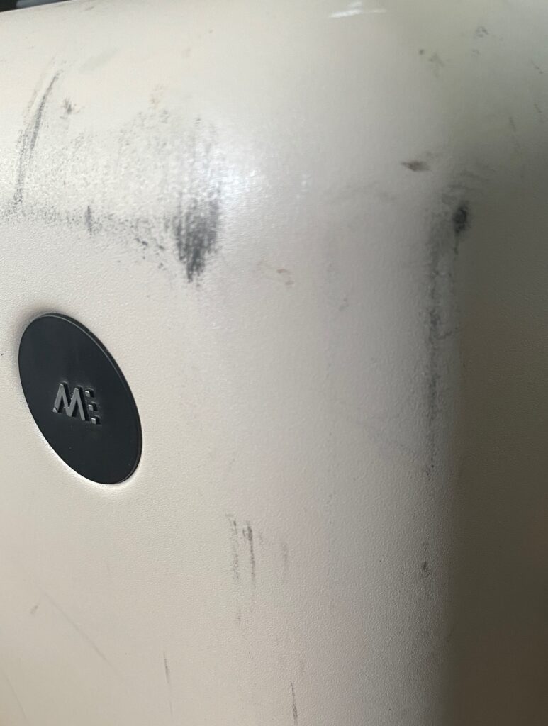 multiple scruffs on monos carry on luggage