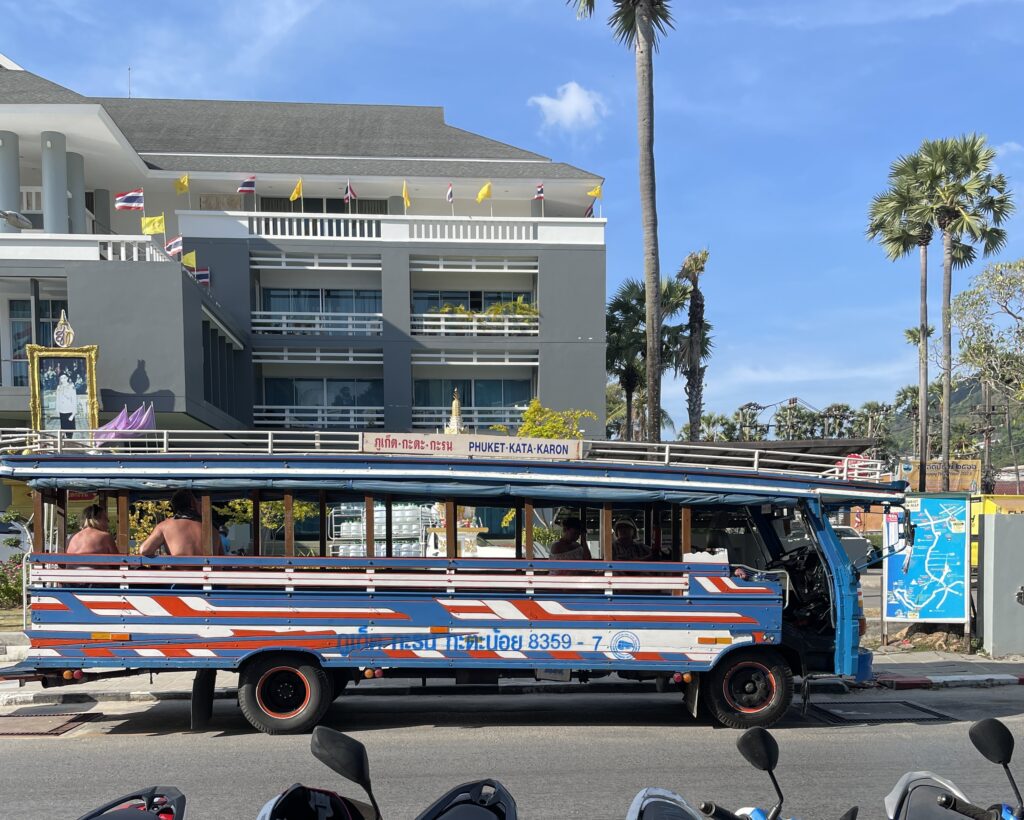 phuket blue bus parked at Kata Beach in Phuket waiting for passengers  