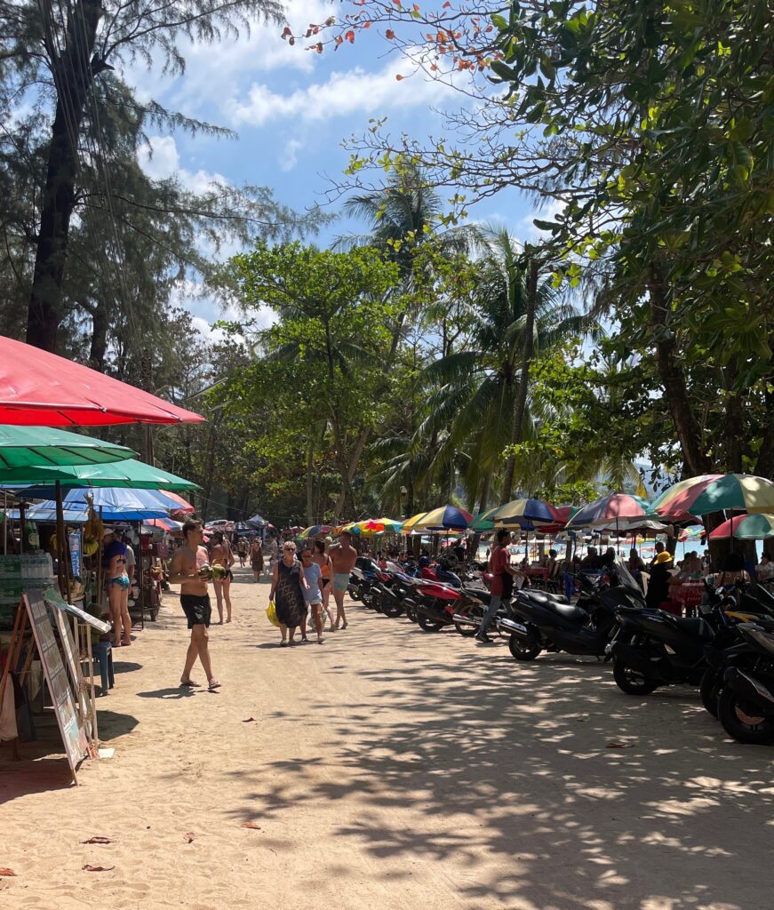 walkway street full of several street food stalls at Surin Beach in Phuket