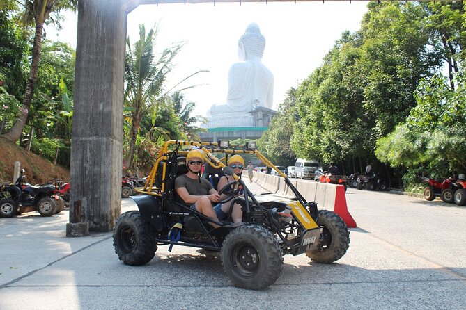 tourist on a ATV by the Big Buddha in Phuket, Thailand