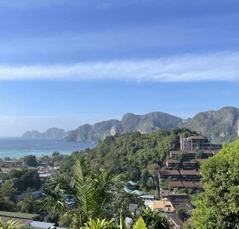 clear skies among many large limestones in the Andaman Sea from the Phi Phi Islands in Thailand
