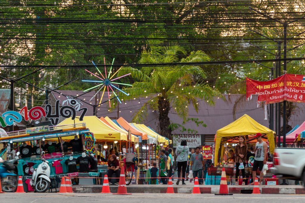 several locals and tourist walking around the famous Krabi Night Market