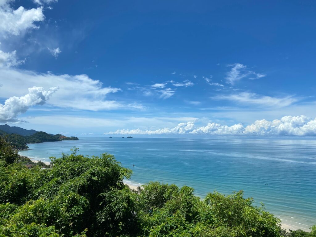 extensive long shoreline from a viewpoint in Koh Chang on a sunny clear day
