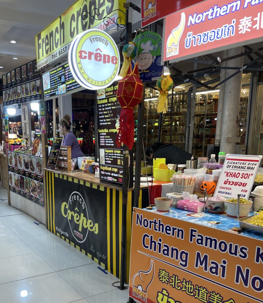crepes, Khao Soi and many others food items being sold at the night market in Chiang Mai