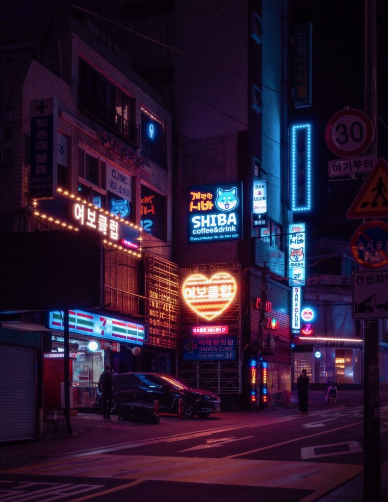 several bright neon lights lit up at various bars in Itaewon, Seoul 