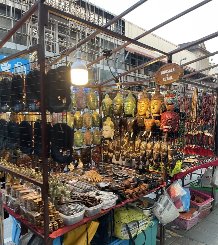 several hand crafted wooden items on display at the Night Bazaar Chiang Mai