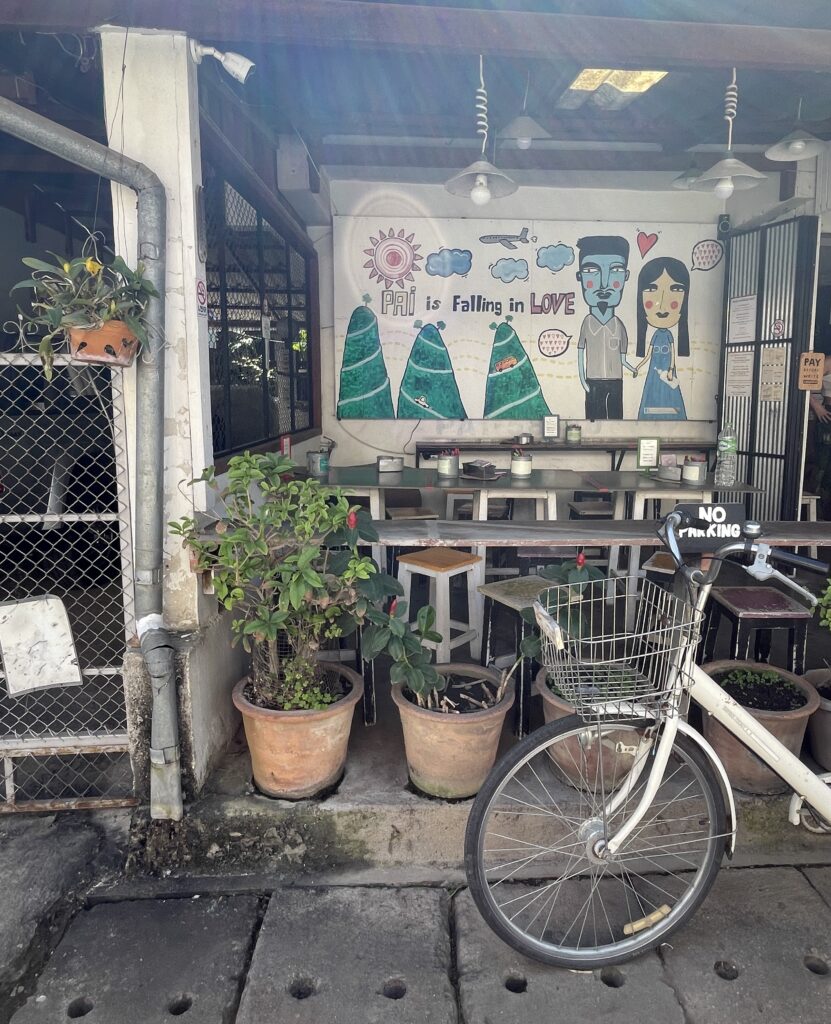 a charming cafe with many decorations in Pai, Thailand 
