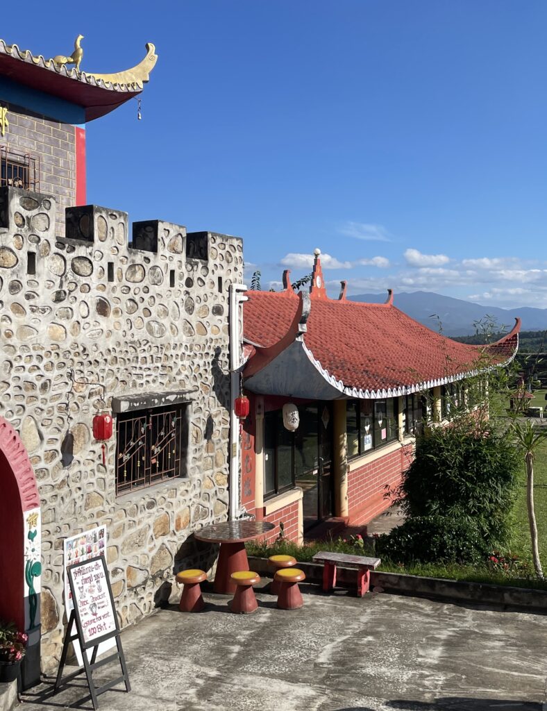 old structures and greenery at the Chinese Village in Pai 