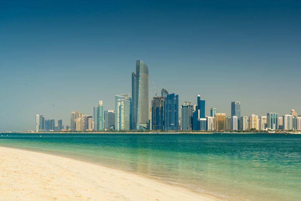 Abu Dhabi's dense skyscraper area in the city from the beach 