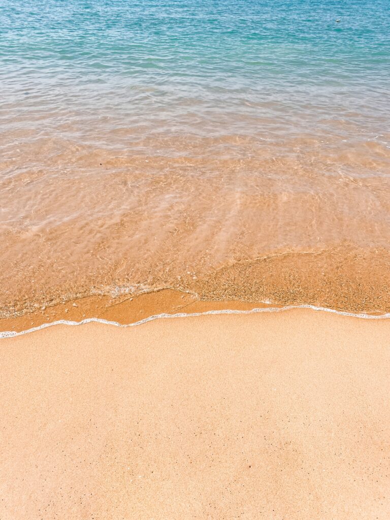 closeup of a beautiful crystal clear water shoreline in Khao Lak, Thailand