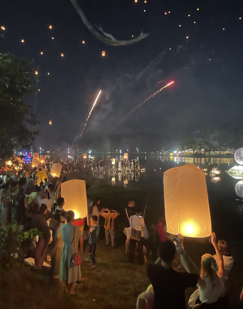 fireworks and lanterns in the sky at Doi Saket park during the Lantern Festival