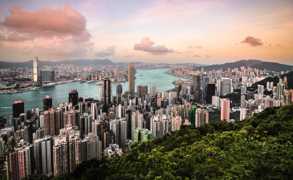 aerial views of the densely skyscrapers along Hong Kong's skyline viewed from Victoria Park