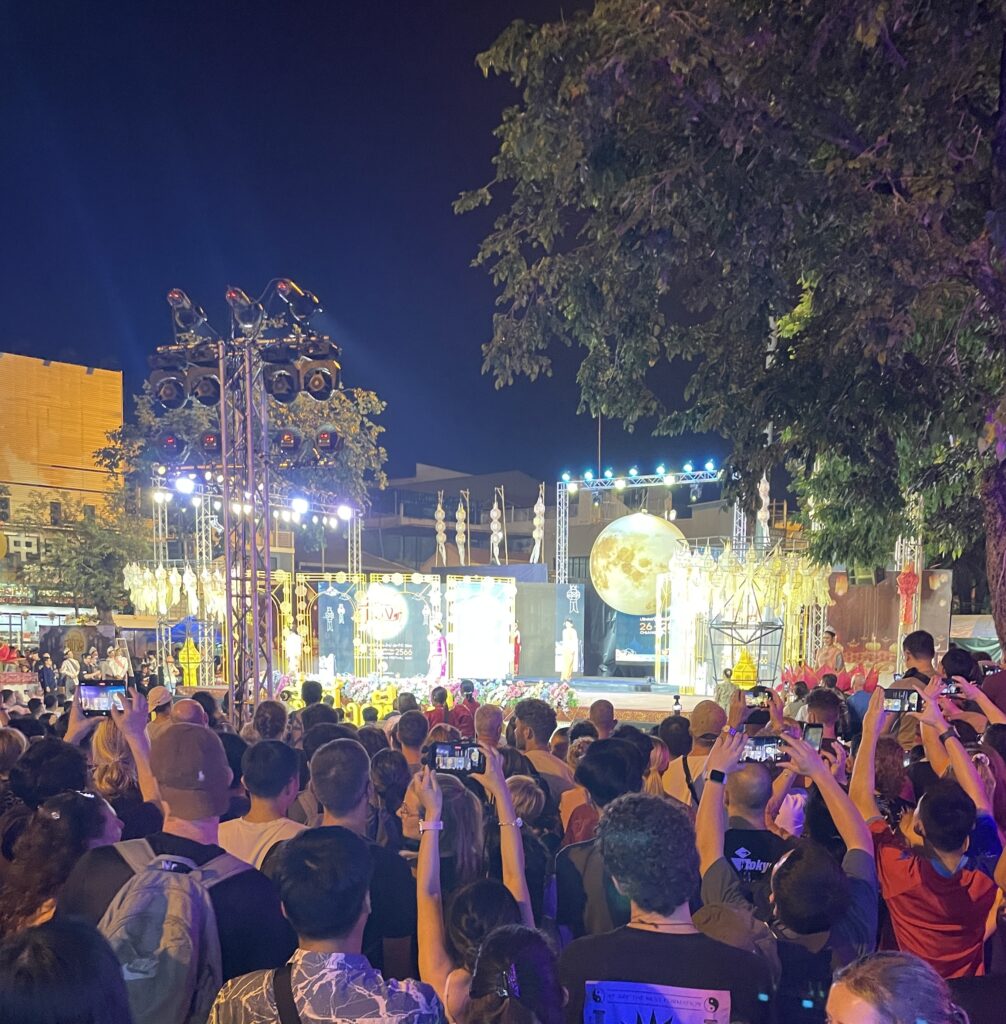 several people attending the Opening Ceremony for the Lantern Festival at Tha Phae Gate in Chiang Mai  