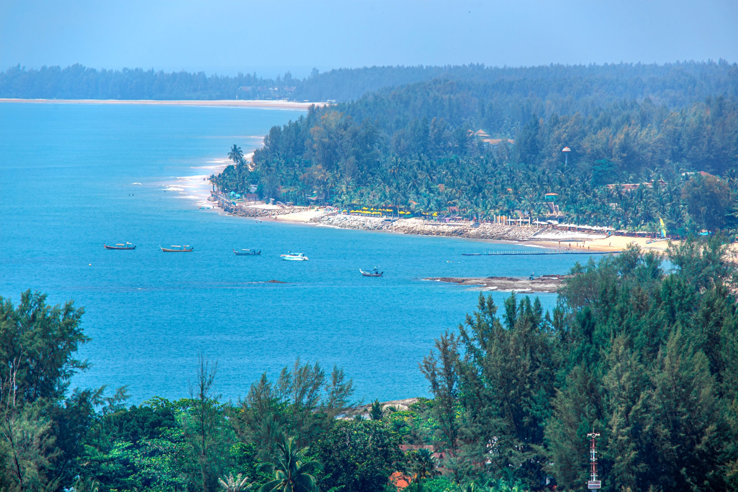 a viewpoint of several beach shorelines and forest greenery in Khao Lak, Thailand