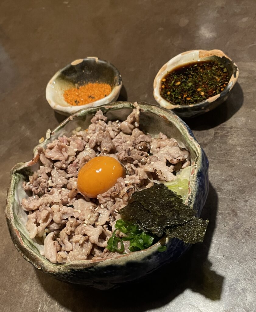 donburi beef rice bowl being served at BoonpunZaruAndDon restaurant in Chiang Mai 