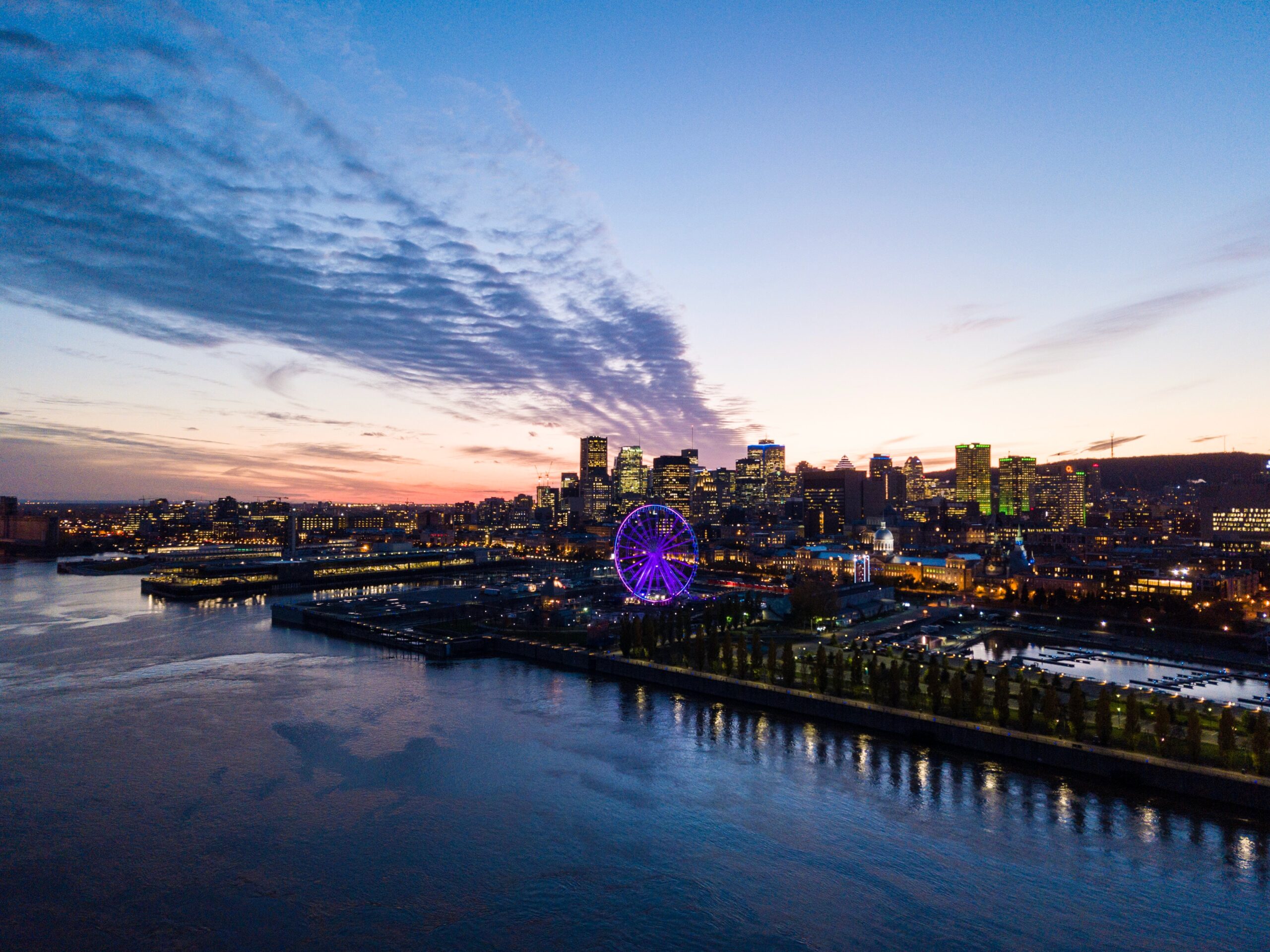 panoramic views of a vibrant coloured sky during sunset on a Summer night in Montreal / Is Montreal safe at night