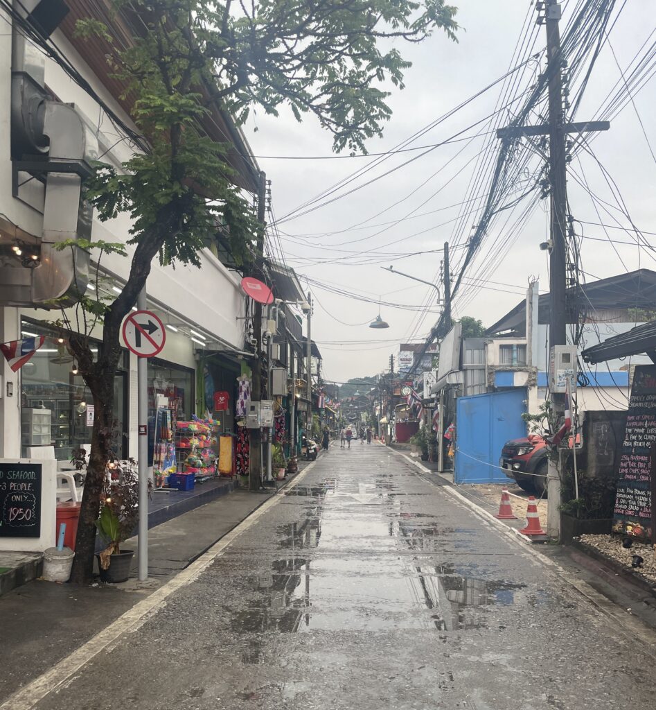 an empty rainy street in the Fishermen's village area in Koh Samui, Thailand 