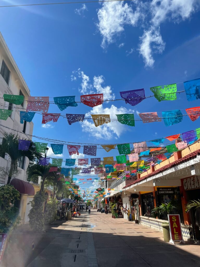 many stores and bars along the roads of Centro, Cozumel the main part of the island in Mexico on a clear sunny day 