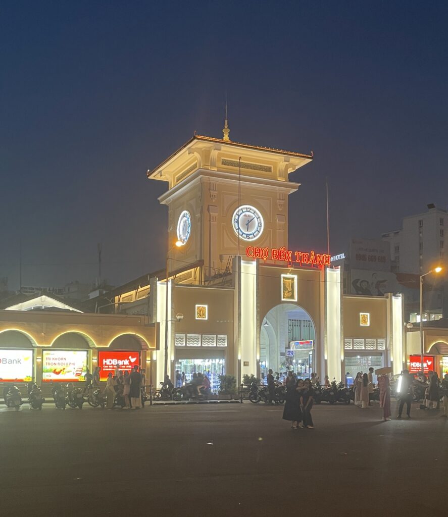 bright lit up signage at the historic famous Ben Thanh market at night in Ho CHi Minh City
