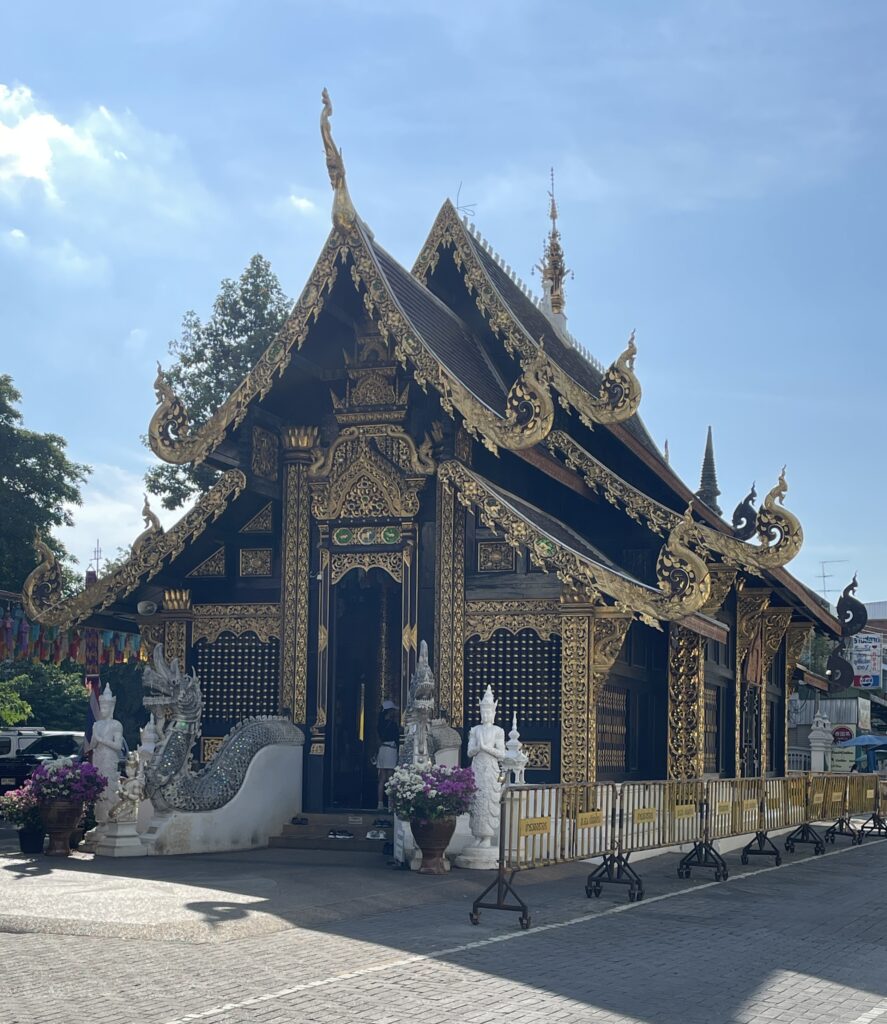 a stunning blue coloured temple in the Old City of Chiang Mai on a sunny day 
