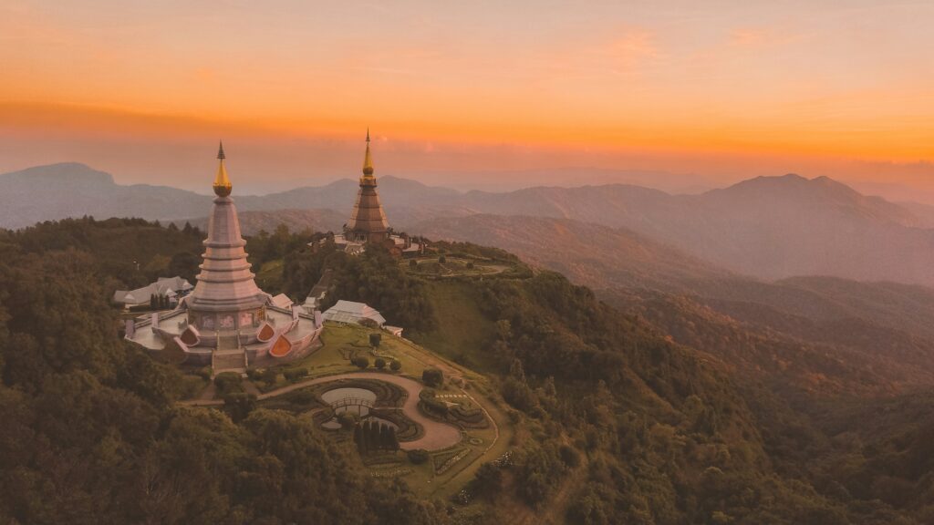 a vibrant sunset setting in over Doi Inthanon National Park