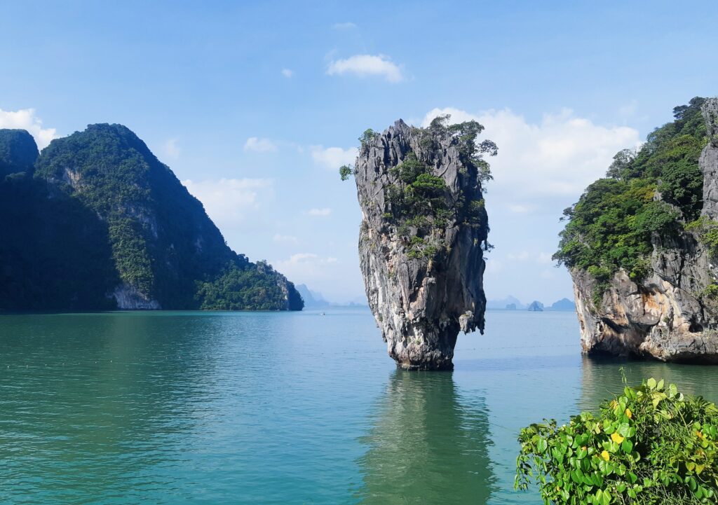 the famous James Bond Island standing tall in Phang Nga Bay in Thailand