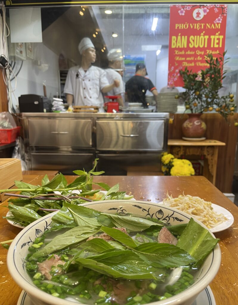 a warm bowl of Pho, a popular Vietnamese soup being served at Pho Viet Nam restaurant in Saigon 