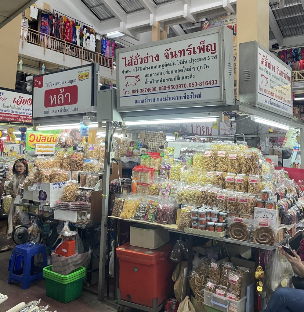 dried fruits, candies and many produce being sold by vendors at Warorot Market in Chinatown, Chiang Mai 