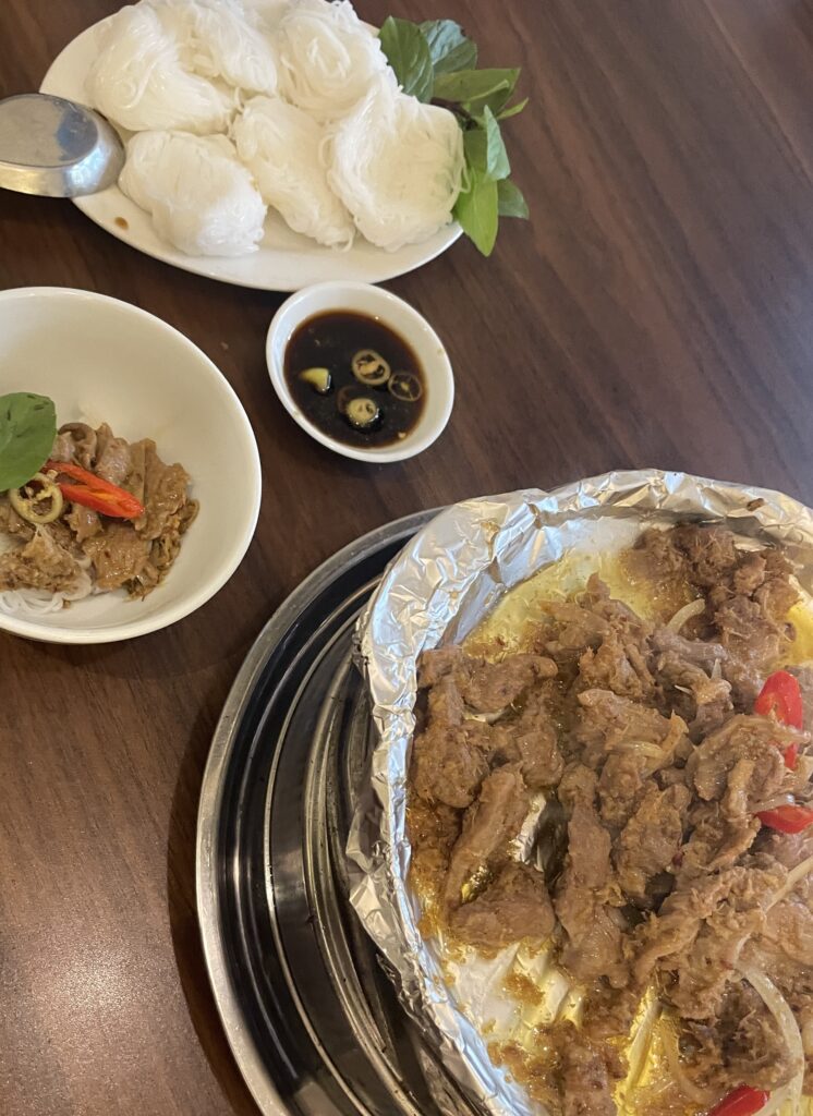 sizzling duck served with Vietnamese noodles at Don Duck