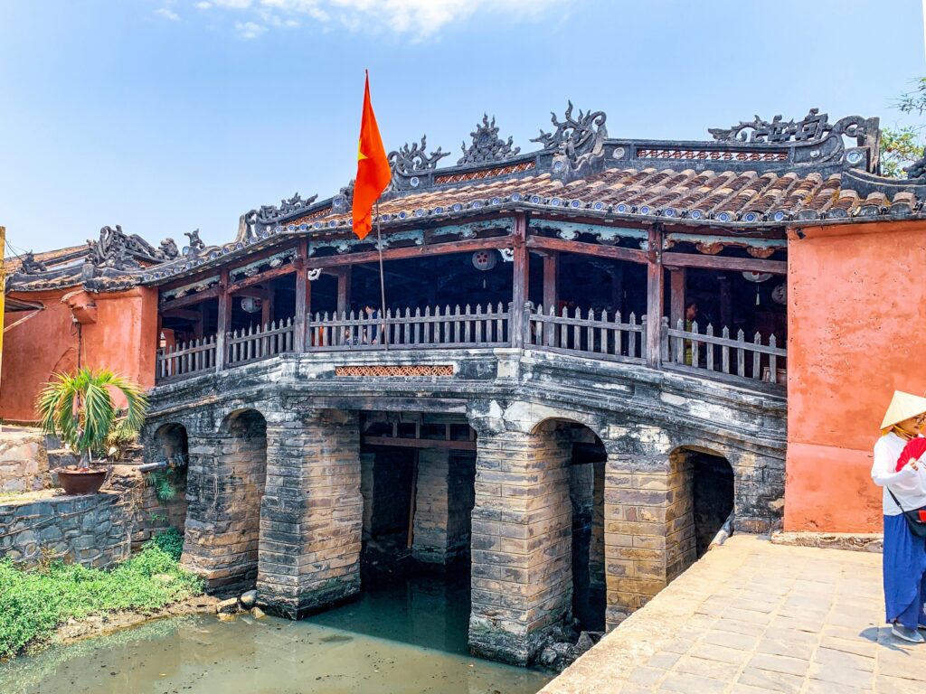 the multi coloured Japanese covered Bridge in Hoi An, Vietnam on a sunny day 