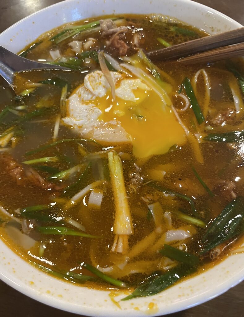 a runny yolk in a different type of pho 