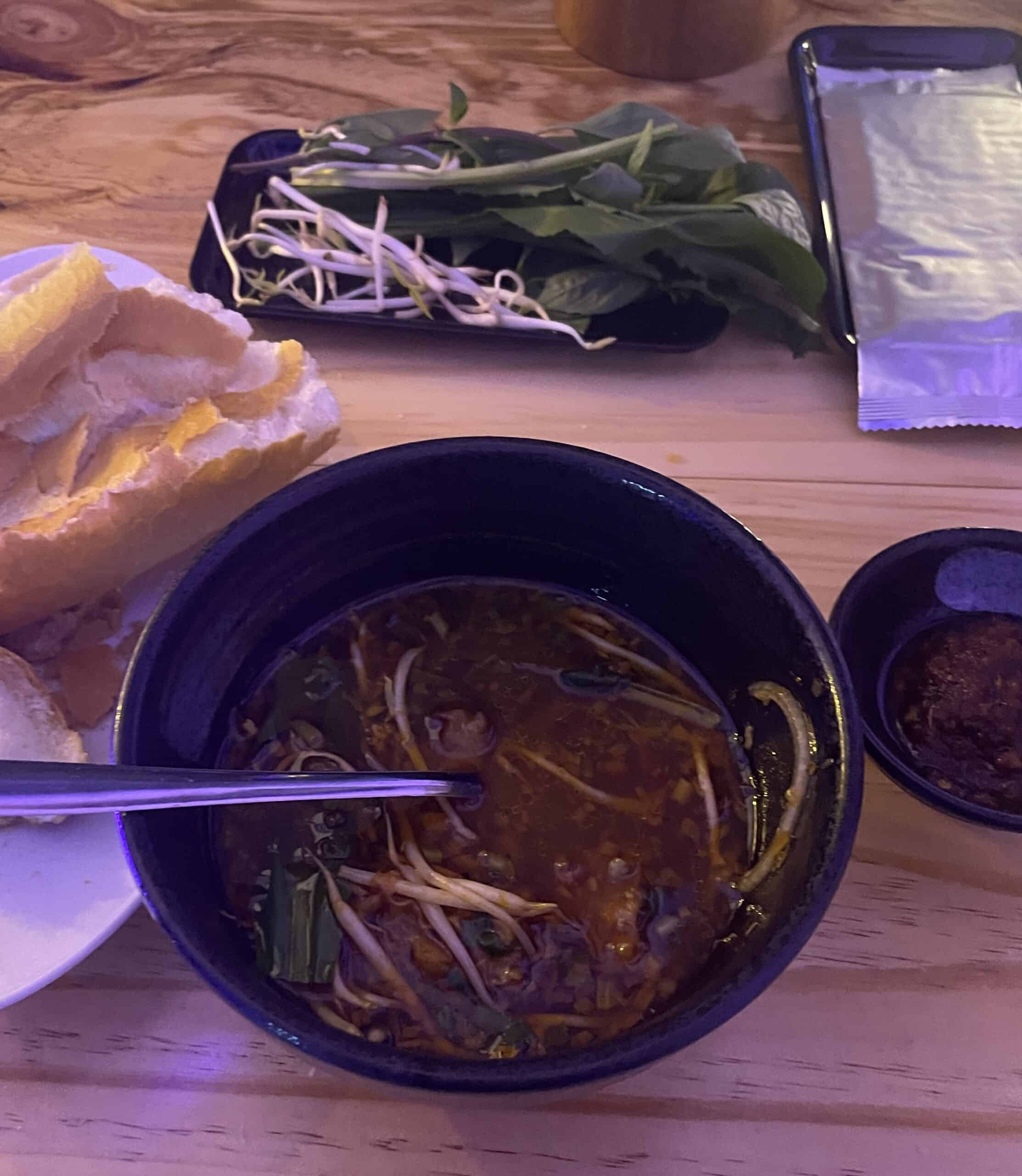 bo kho served with fresh veggies