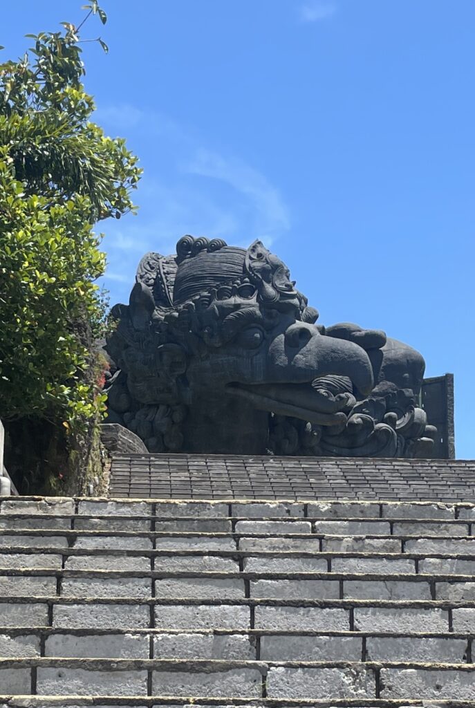 Massive chicken statue at a cultural park in Bali, symbolizing local heritage and traditional artistry.
