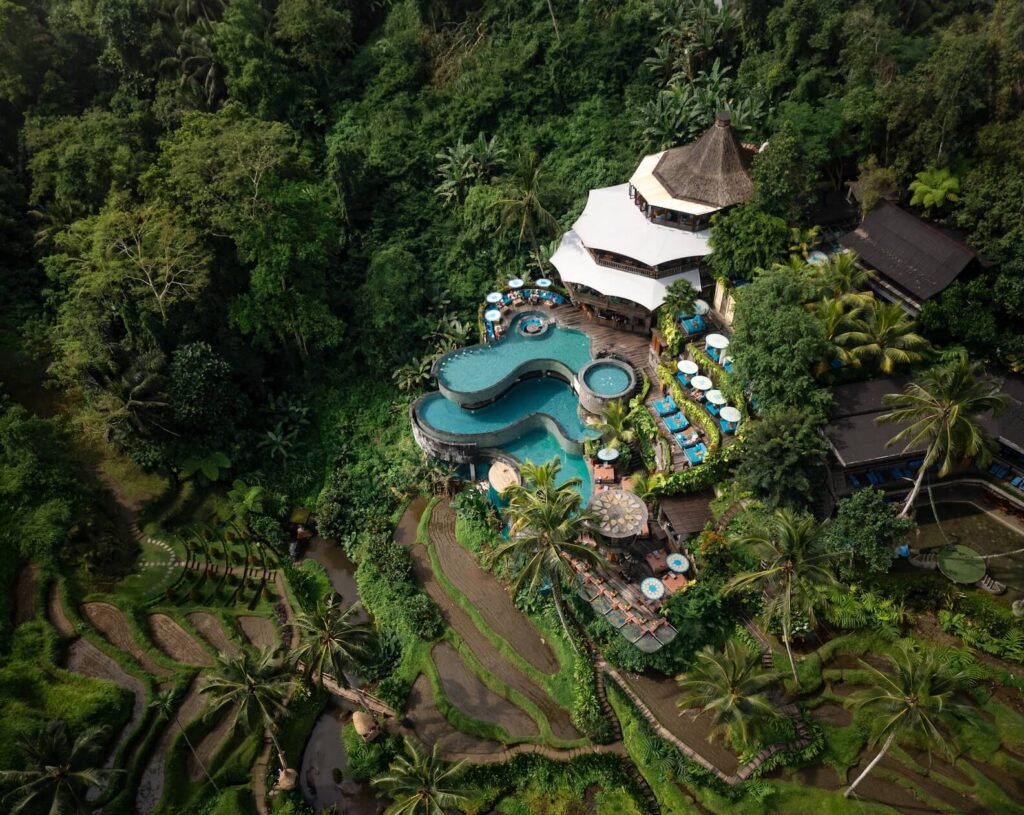 Aerial view of Cretya Ubud, Bali’s scenic jungle beach club with tiered pools and lush rice terraces