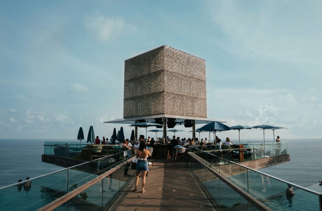 Cliffside views and vibrant crowd at Savaya Beach Club in Uluwatu, Bali