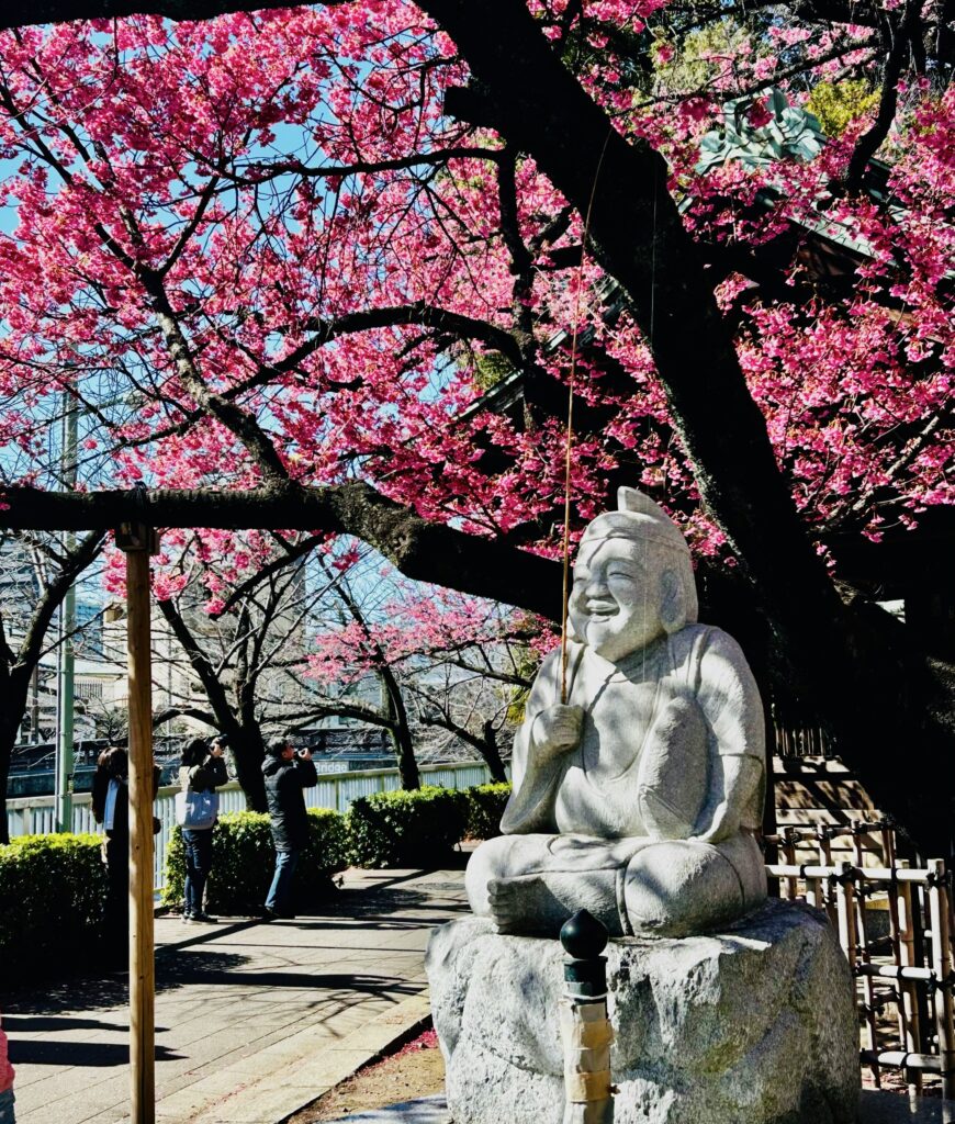 Peaceful street in Shinagawa with a traditional temple, showcasing the calm side of Tokyo’s best neighborhoods to stay in