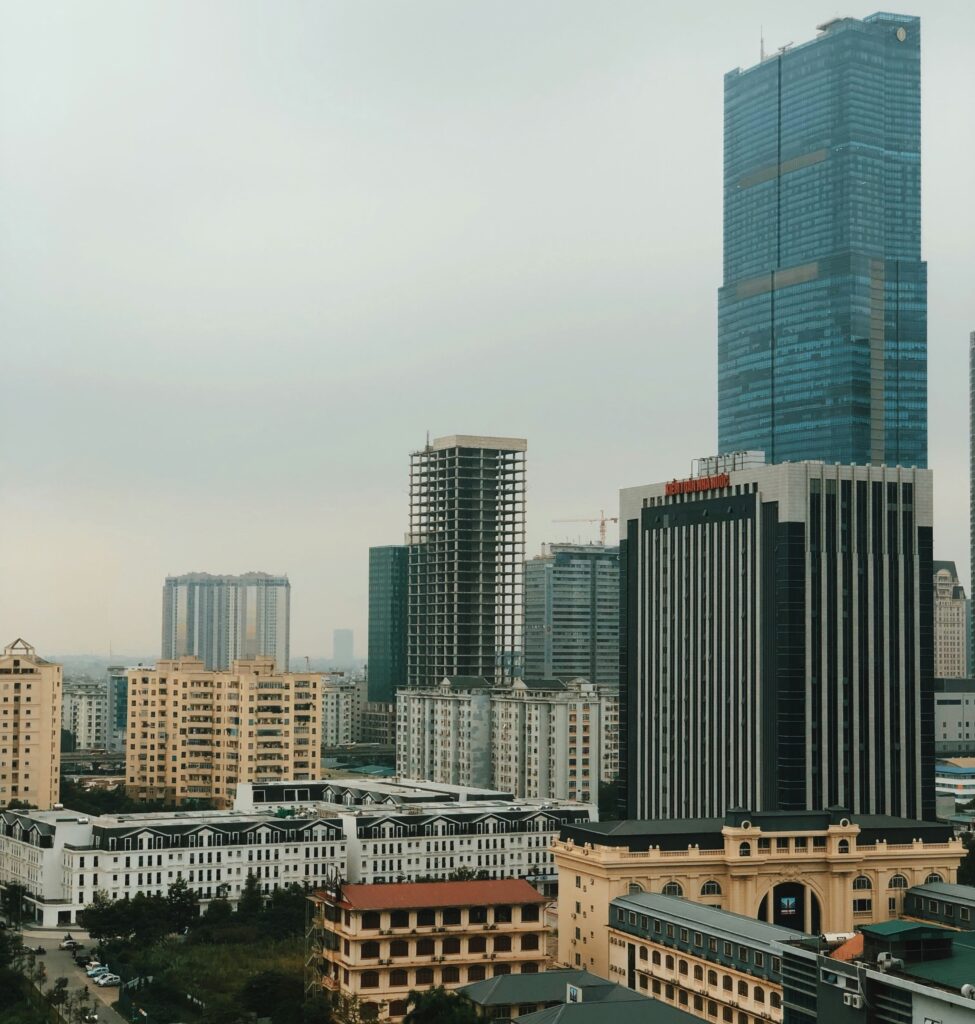 Business buildings in Cau Giay District, Hanoi on a cloudy day, showcasing the city’s modern urban development.
