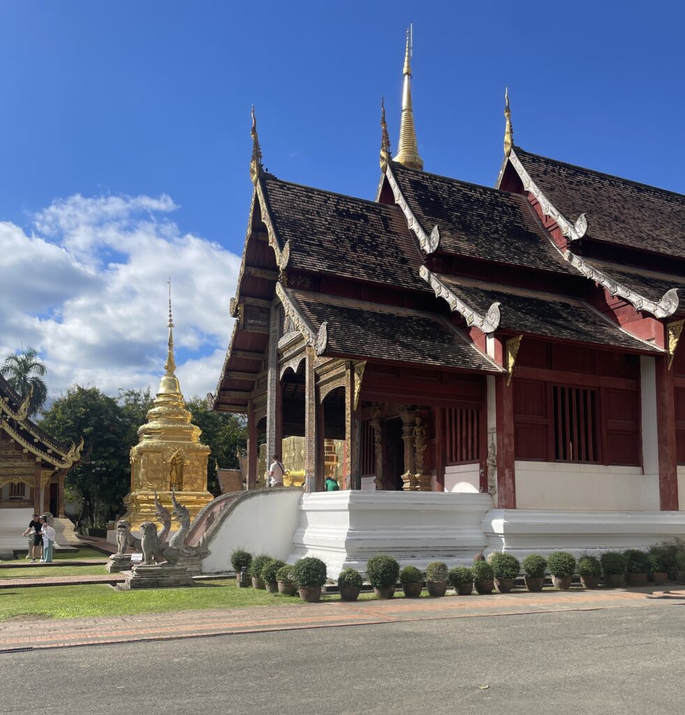 Stunning temples in Chiang Mai’s Old City on a sunny day, showcasing traditional Thai architecture.