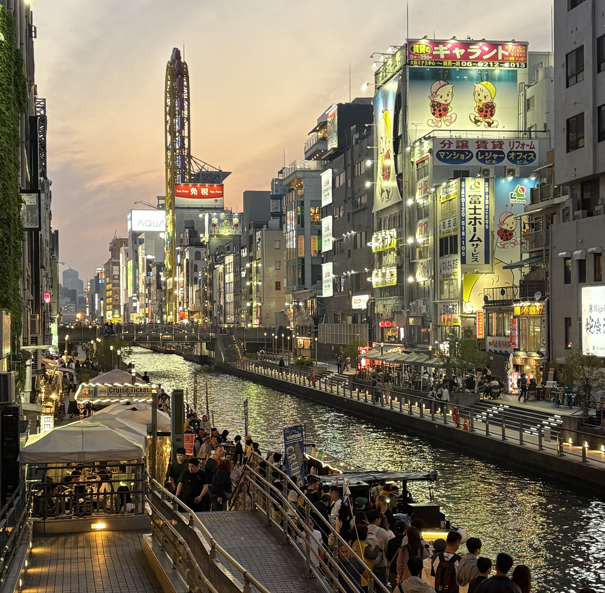 Dotonbori canal at sunset in Osaka, Japan. One of the best places to visit for food, lights, and atmosphere