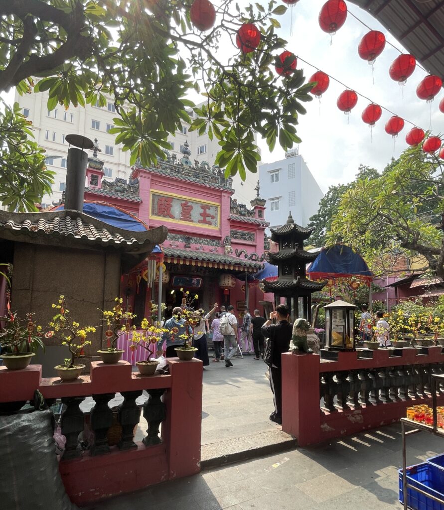 Tourists and locals taking pictures at the Jade Emperor Pagoda in the Da Kao area of Ho Chi Minh City

