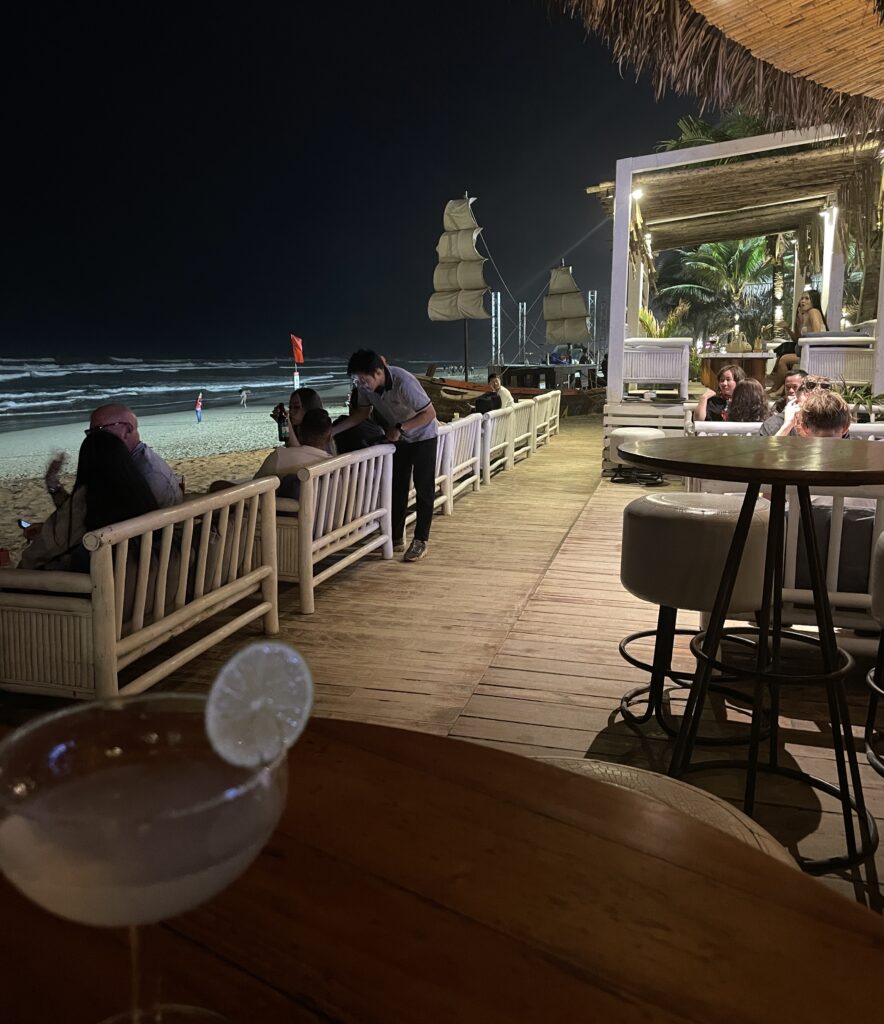 Margarita cocktail served at Maia Beach Bar in Da Nang during the evening, with a relaxed seaside atmosphere and ambient lighting.