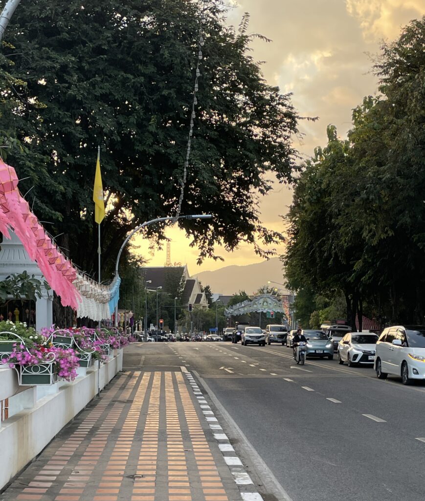 A beautifully decorated bridge in Chiang Mai stretching over the Ping River, connecting the city center to the scenic Wat Ket area.
