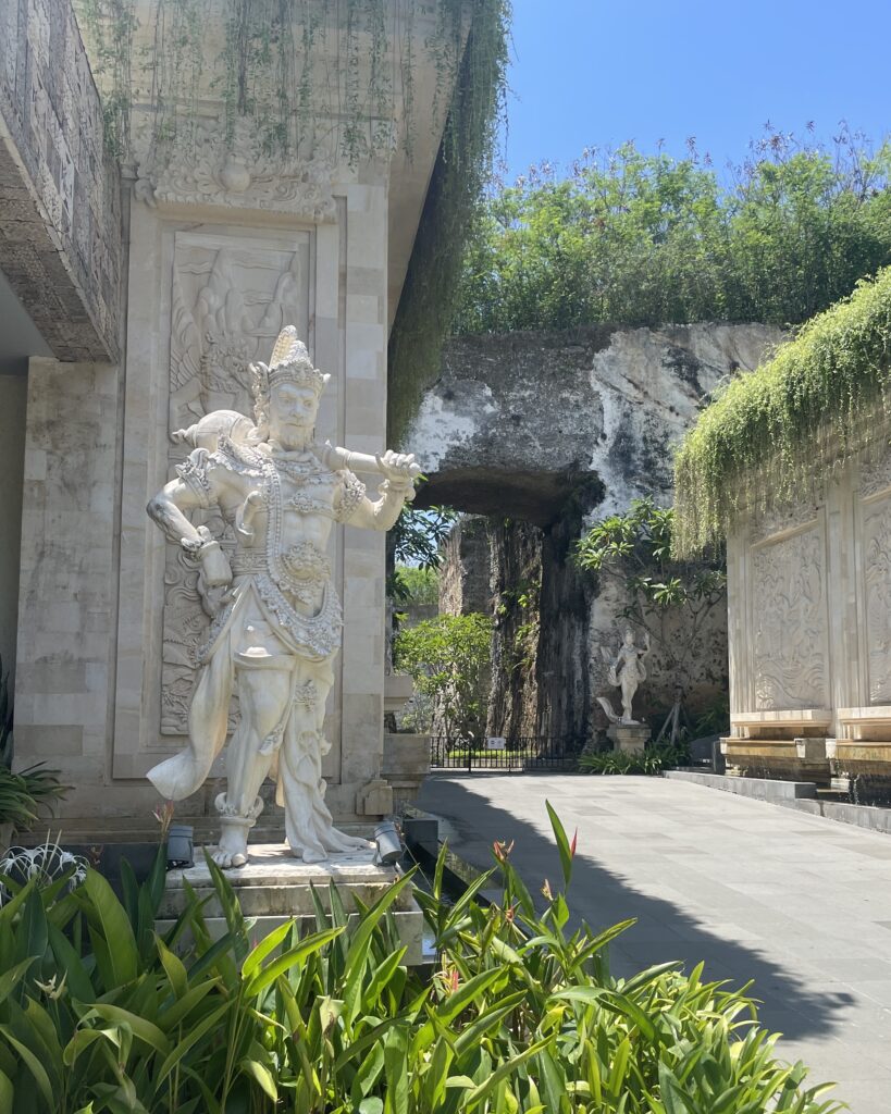 Statue and clear walkway on a sunny day at Garuda Cultural Park in Bali