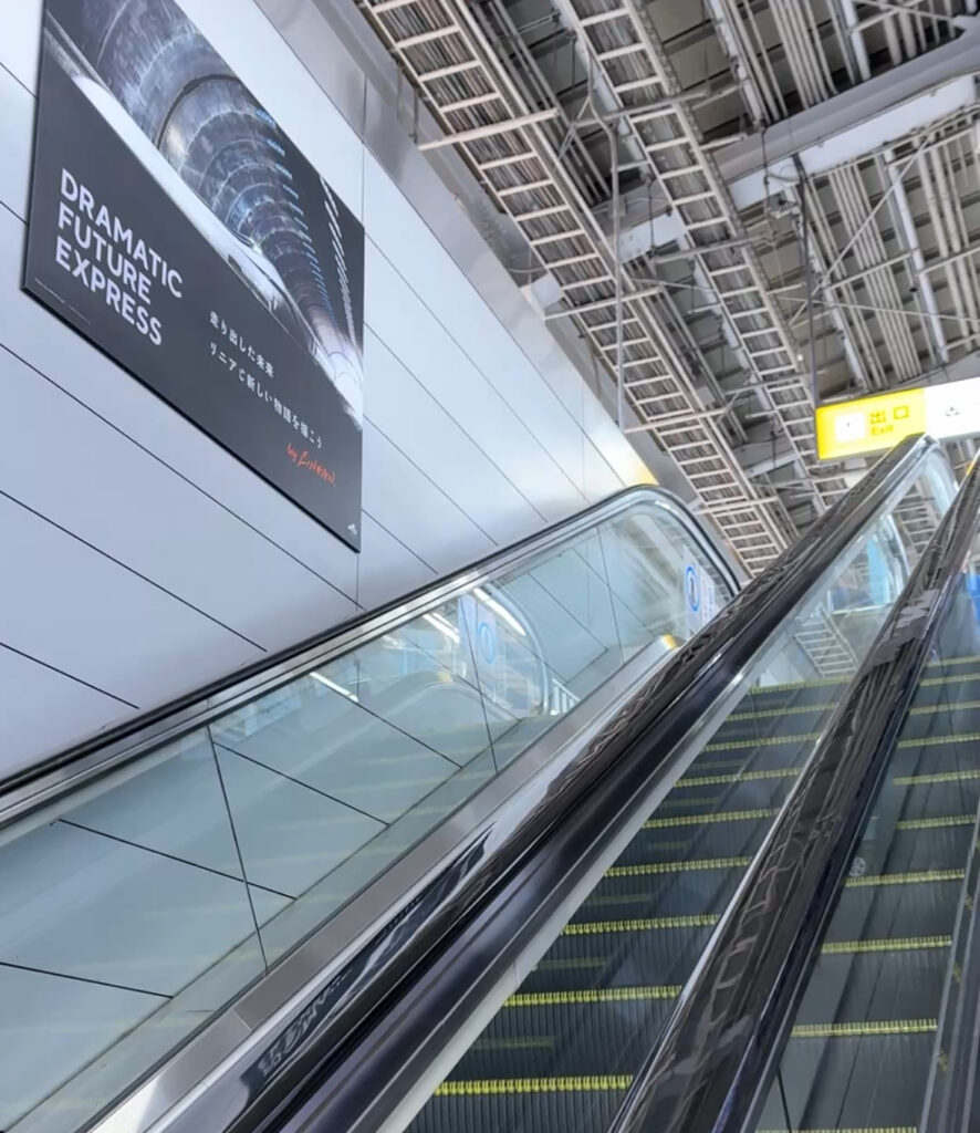 Escalator leading up to the bullet train platforms at Osaka Station in Japan.