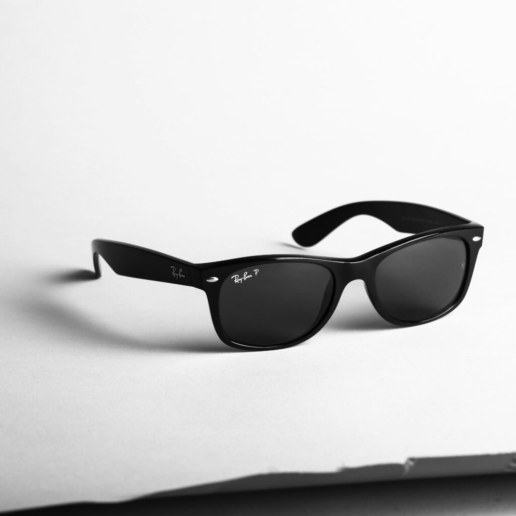 Classic black Ray-Ban sunglasses on a table