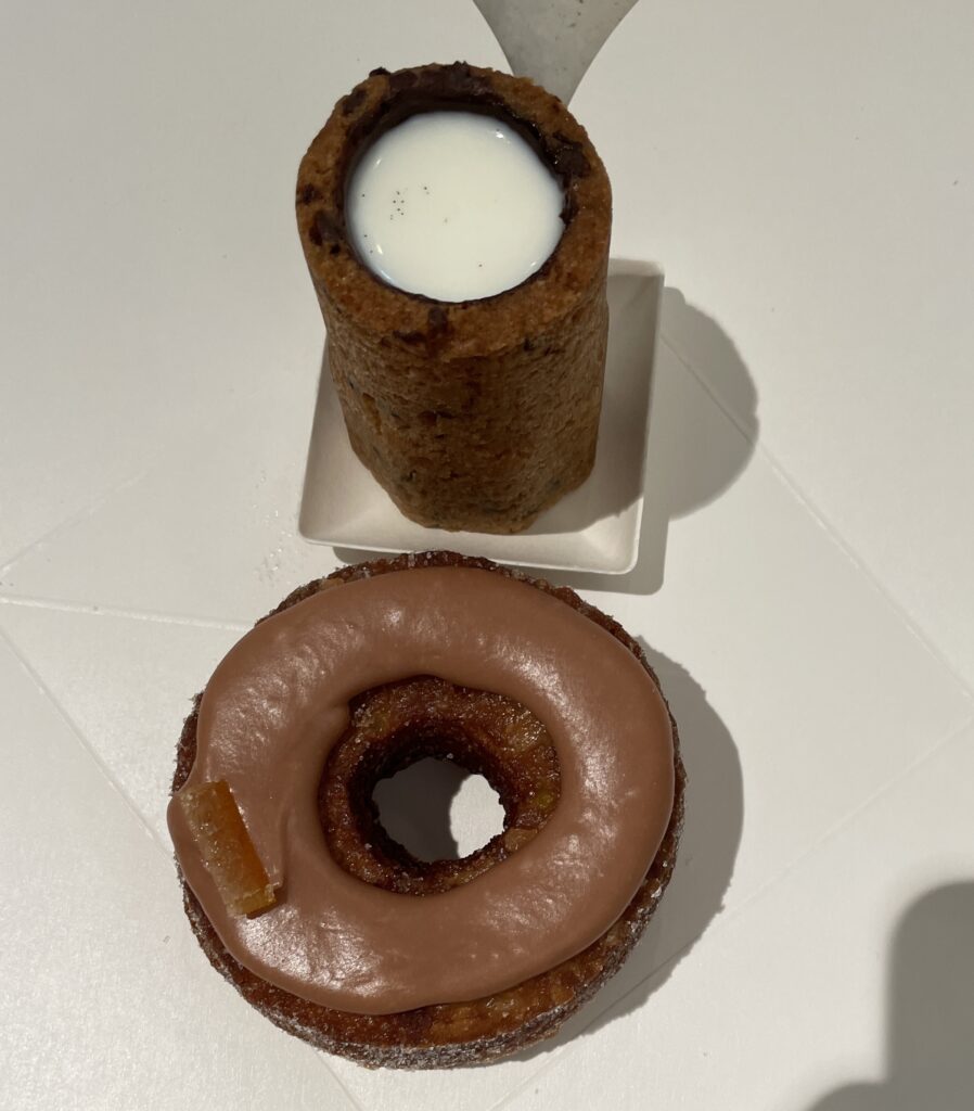 Famous cronut and chocolate chip milk shot served at Dominique Ansel Bakery in SoHo, New York City.